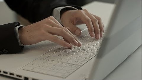 Man Typing On Laptop Computer Keyboard | Stock Footage - Videohive