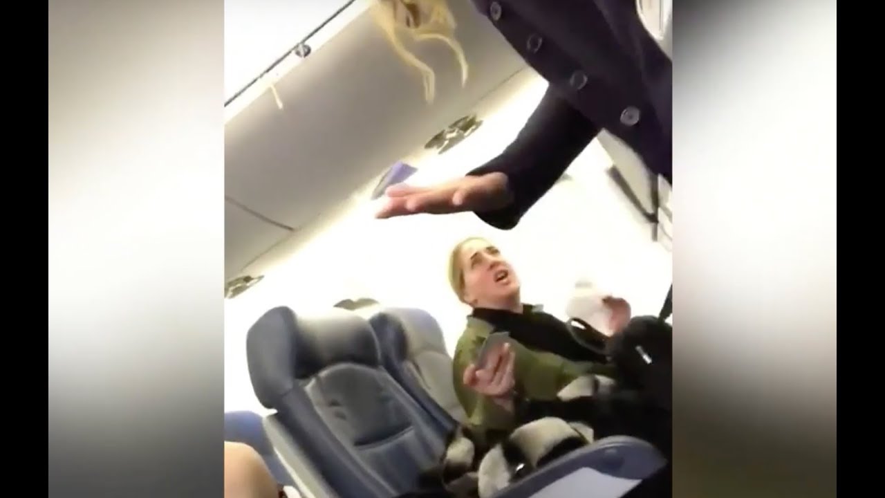 Delta passenger who 'screamed at a woman and her baby' placed on leave from government job