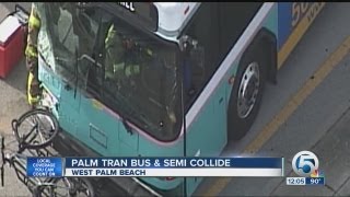 14 treated after bus, semi collide