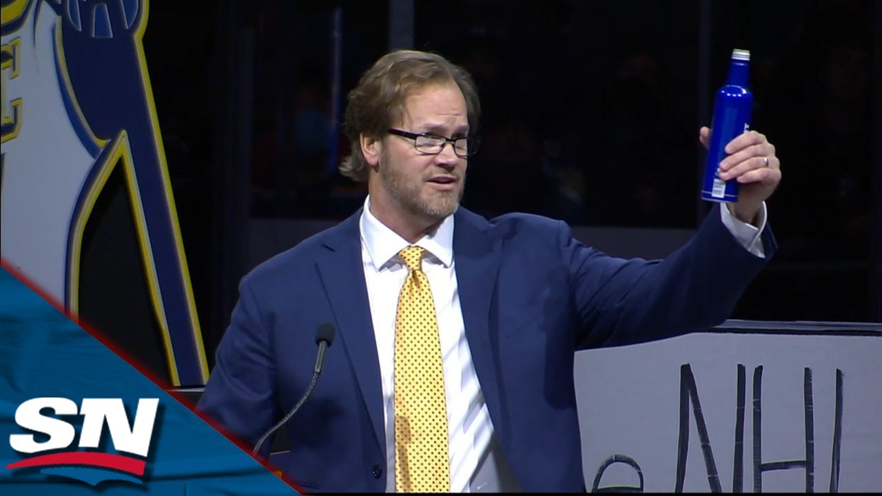 Chris Pronger chugs a beer as his No.44 is retired by Blues