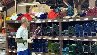 Process of making glass handicrafts. A Japanese glass factory with a history of 100 years
