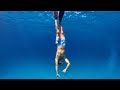 Hand feeding fish in Exuma, The Bahamas!