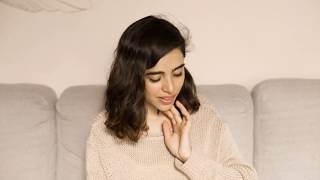 Ebook Video Mockup Of A Beautiful Girl Reading While Sitting Down