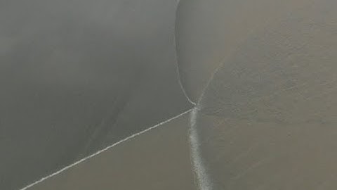 Tidal Bores Intersect to Form Unique Criss Cross Shape on East China River