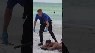 Airport Security Goes Metal Detecting On Beach