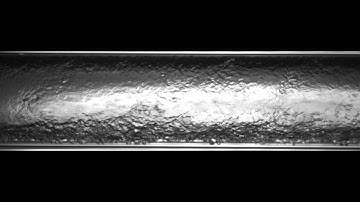 Horizontal Two-Phase R-123 Annular Pseudo-Slug Flow: V03L075.mpg