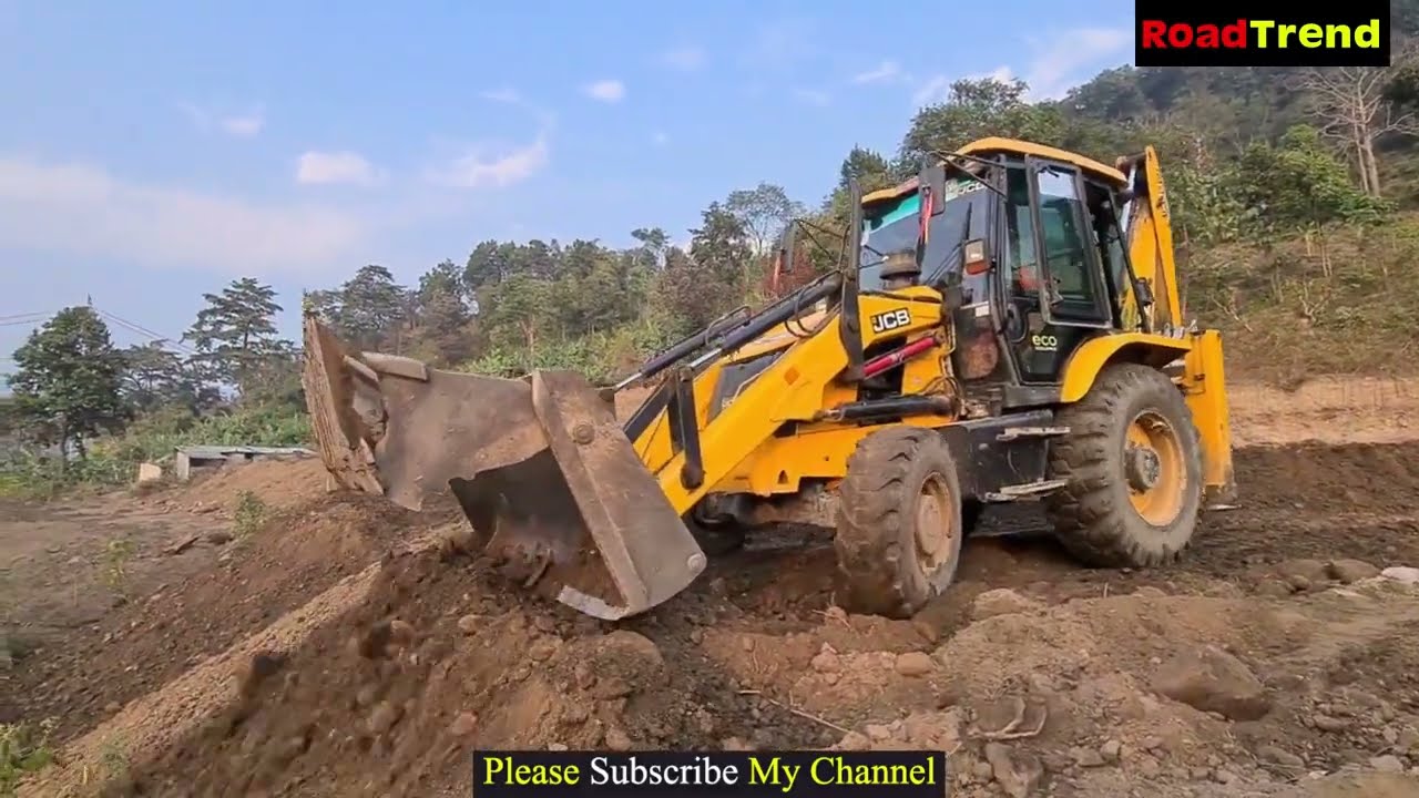 JCB Backhoe pushing mud in hill /Backhoe machine working hill