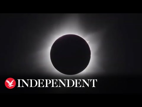 Moment rare total solar eclipse plunges Australia into darkness