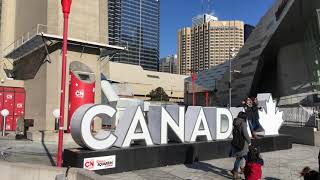 Walking west from bay street and lakeshore blvd around the south face
of scotiabank area through jurassic park to bremner blvd, on p...