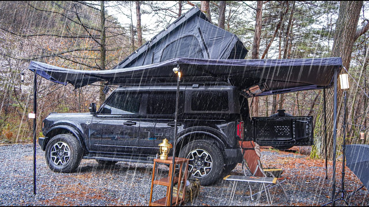 Solo Car camping in the heavy rain | with iKamper rooftent, Ford Bronco