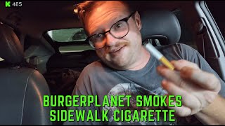 BurgerPlanet Smokes Cigarette Found on Sidewalk
