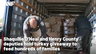 Shaquille O’Neal and Henry County deputies hold turkey giveaway to feed hundreds of families