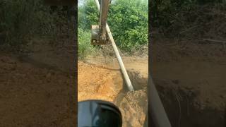 Excavator Installation of Utility Poles