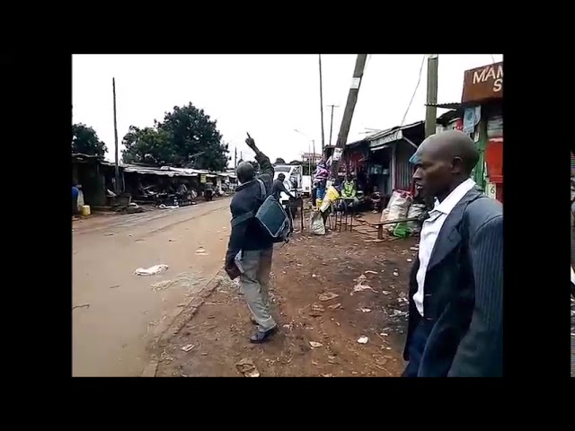 WFF   GMFC Brethren Preaching in Otiende Market Kibera Slum Kenya