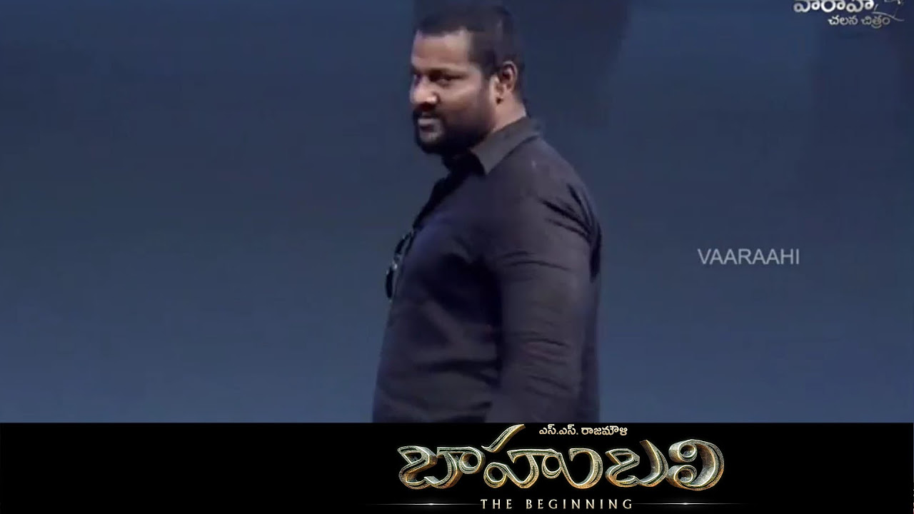 Prabhakar Speaks Kilikili Language  Baahubali Audio Launch   Prabhas SS Rajamouli