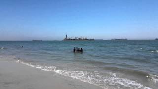 Baptism at the beach: Tevian getting baptized, 6-7-2015