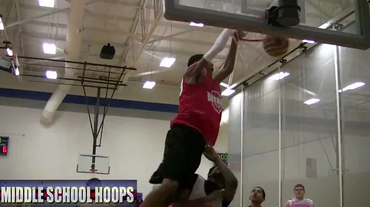 8th Grader Derrick Daniels catches oop on defender...