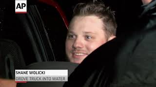 Men pull truck from Raleigh flash flood