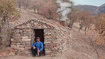 building a DIY winter Survival Shelter with fireplace. winter night bushcraft