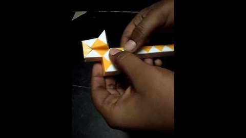 Making of cross with snake cube puzzle