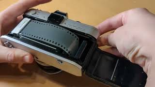 How to load film roll into Canon FX camera