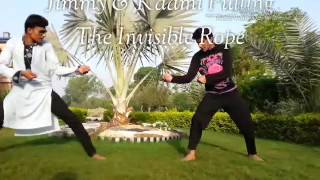 Jimmy & Kaami pulling an invisible rope.
