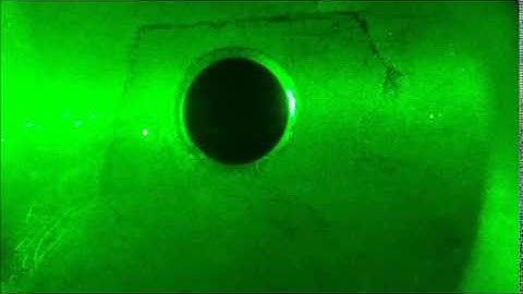 Transporting a trapped particle by moving beam waist - Laser Trapping in Air