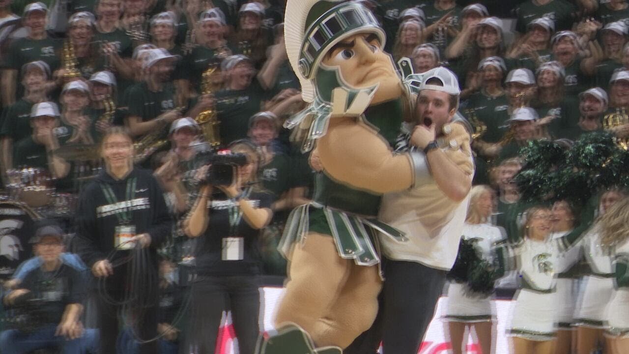 The shot of a lifetime: MSU student Luke Conway nails 94-FOOT PUTT during MSU basketball game