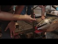 Glassblower preston singletary making a salmon sculpture