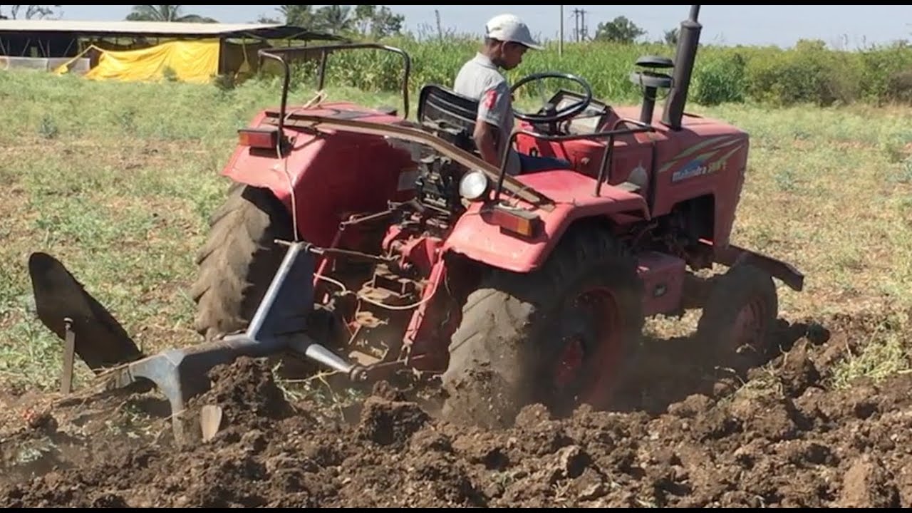 Mahindra 575 DI Farmer Son Doing Plough In Farm Tractors At Work