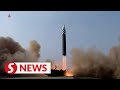 N.Korea TV gives Kim Jong Un 'Top Gun' treatment in missile coverage