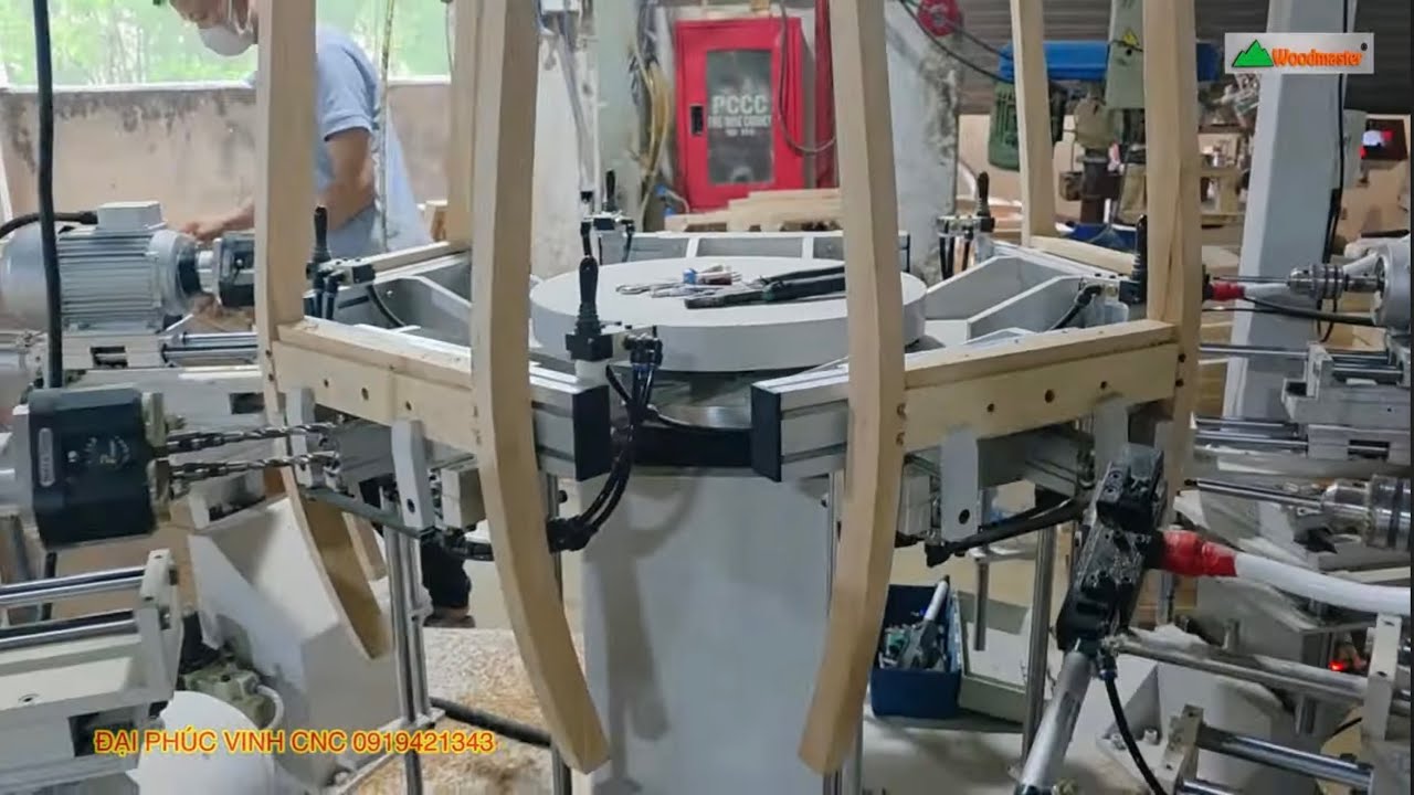 Máy khoan cấy ốc tựa ghế tự động mâm xoay Woodmaster 