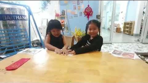 Tiếng Anh Giao Tiếp Thiếu Nhi Tại Phan Thiết: Miki and Nancy talking about Tet Holiday