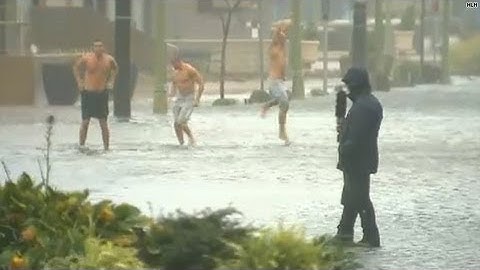 Video bomb: Men dance in storm