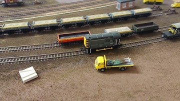 Graham Farish Class 08 DCC sound leaves the yard over three-way point and double slip