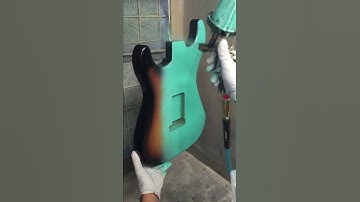 Robie spraying sea foam green over a sunburst for prototype Lynx .