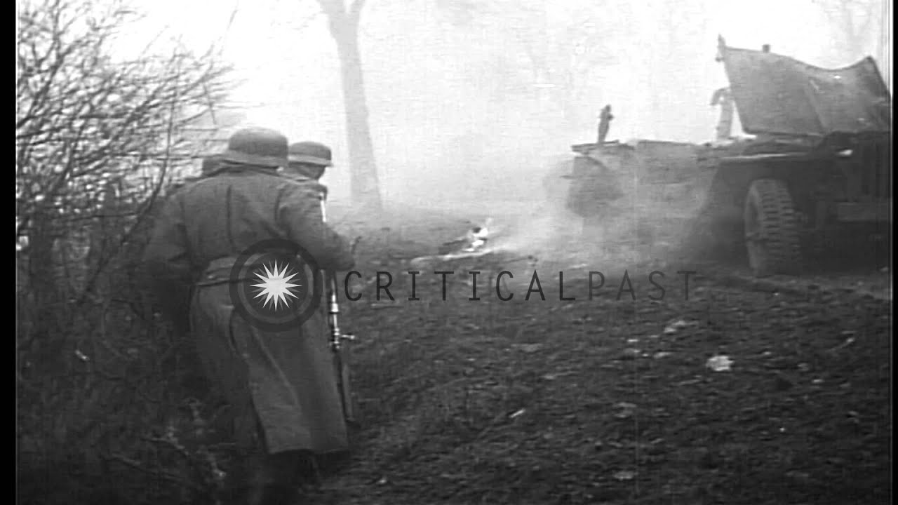A United States convoy burning at a roadside and Kampfgruppe Hansen near Poteau R...HD Stock Footage