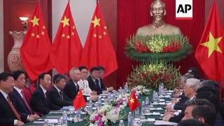 China's Xi meets Vietnam PM and party chief