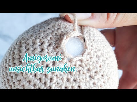 Kopf deines Amigurumi vernähen.