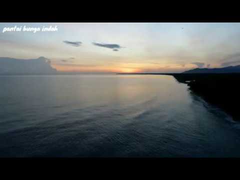 Pantai bunga indah (bolmut) sunrise di pantai bunga indah ...