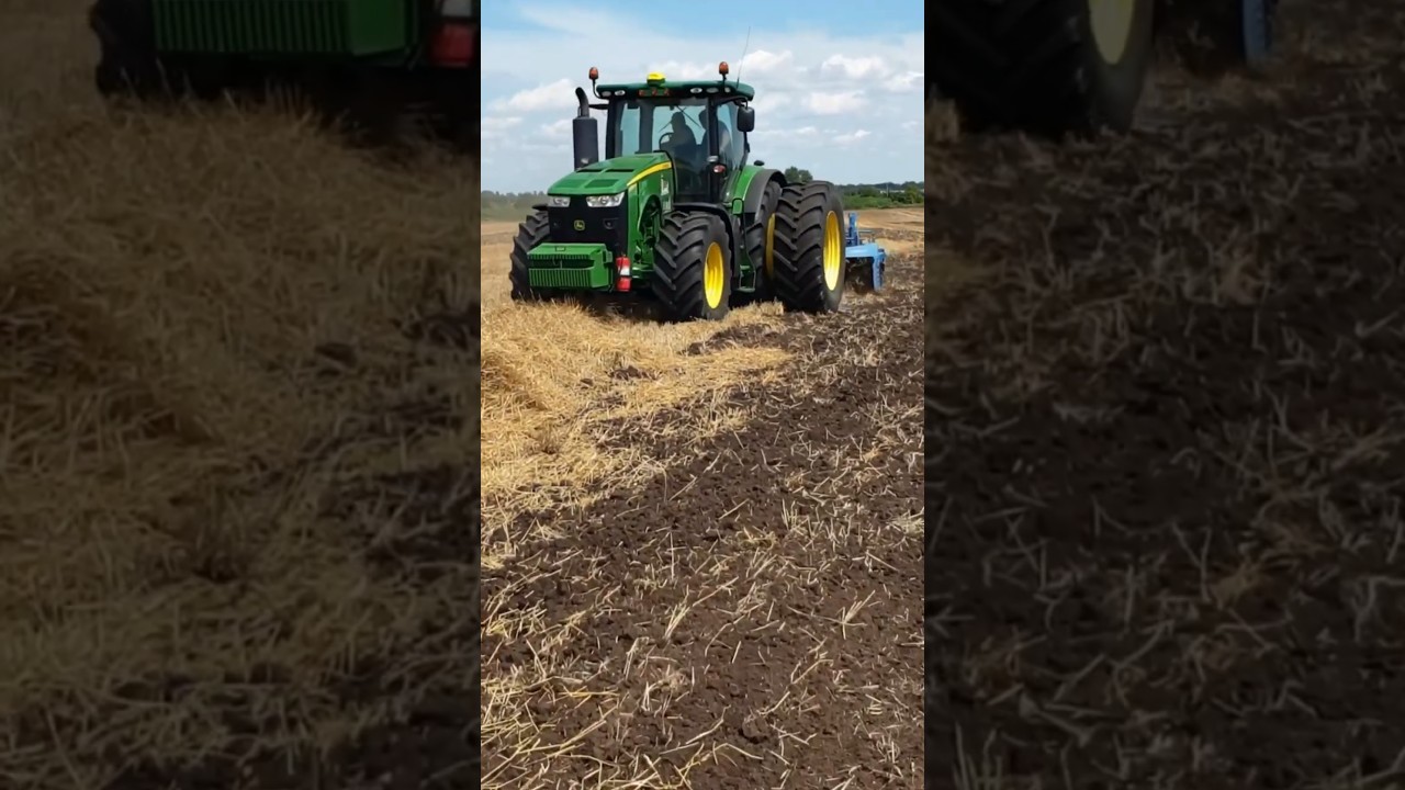 Deere prepping the earth after a golden harvest 