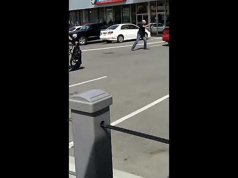 Crazy guy tries to attack police with a hatchet and he gets tazed