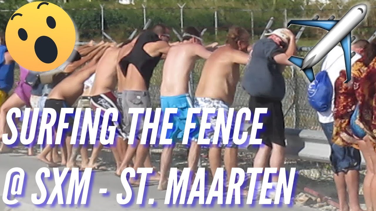 Surfing the fence at SXM - Princess Julianna International Airport, St Maarten, NA