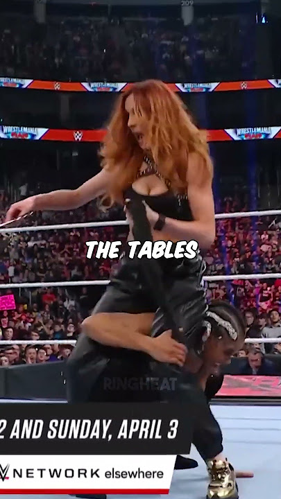 Bianca Belair cuts Becky Lynch's hair