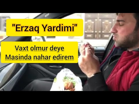 Kamil Zeynalli erzaq payliyanda, yemeyi masinda yeyir, ALLAH komeyi olsun