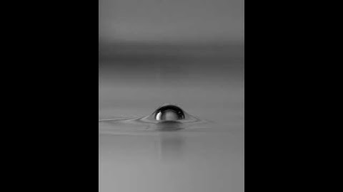 Air bubble crossing a Water (lower):Heptane (upper) interface