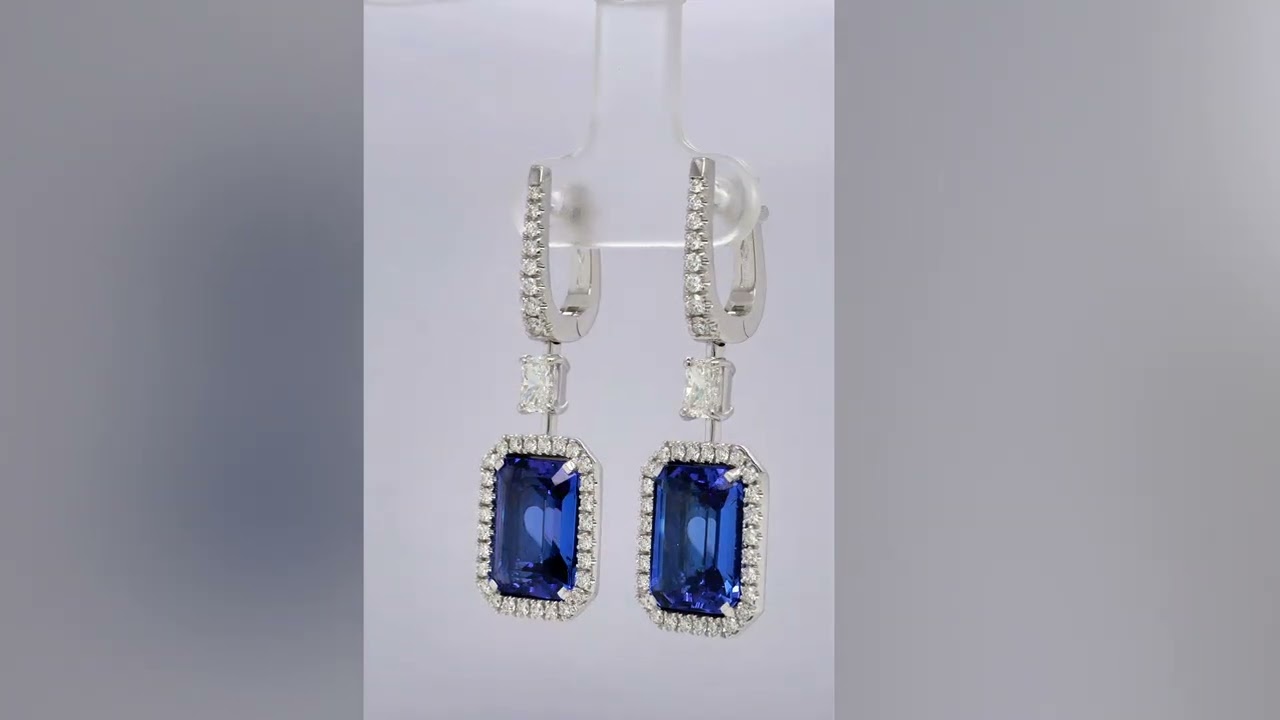Anello in oro bianco con diamanti e tanzanite
