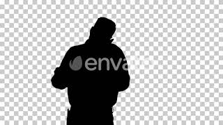 Silhouette Man talking on the phone and making notes, Alpha Channel | Stock Footage - Videohive