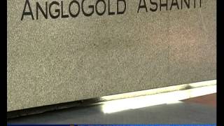 AngloGold to cut more costs after loss on gold plunge