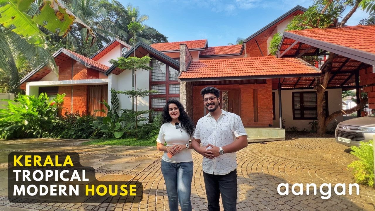 അകവും പുറവും ഒരുപോലെ കുളിർമ്മ കൊള്ളിക്കും TROPICAL MODERN HOUSE |AANGAN | Traditional Home